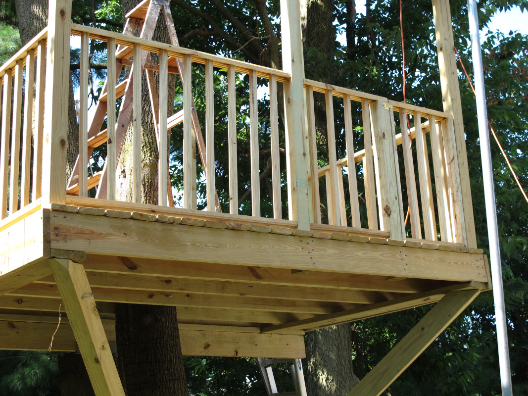 I completed the railing section on 07/21/11. Here is a shot from our deck.